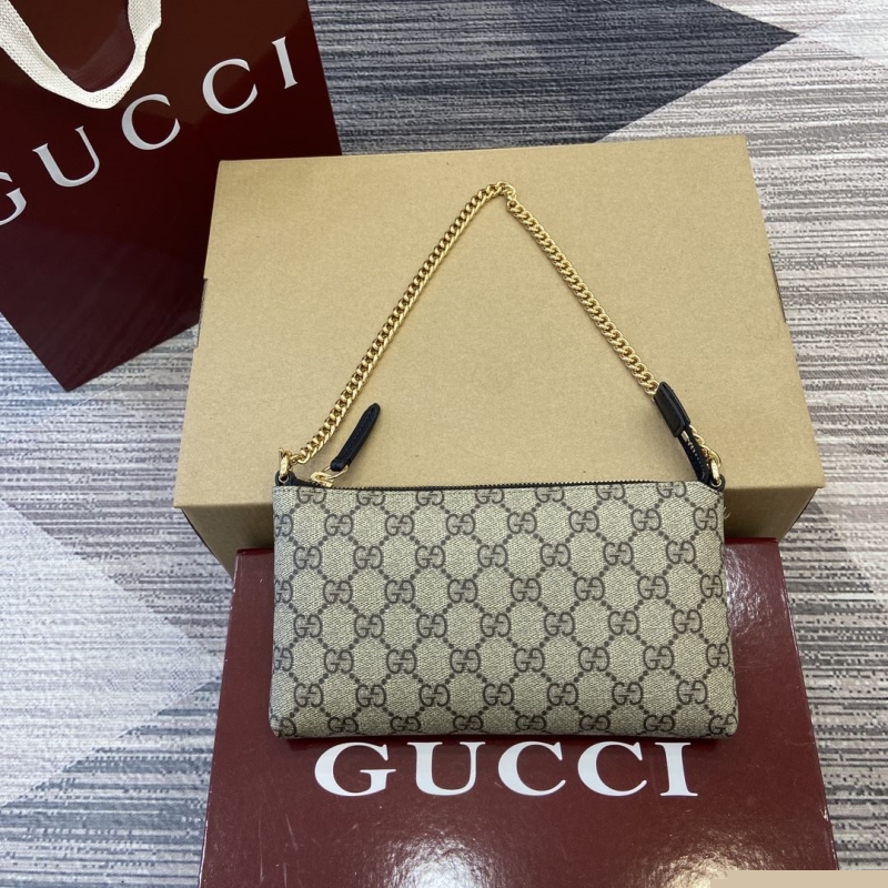 G*u*i top handle bags